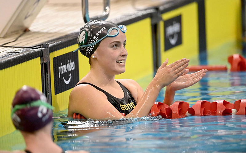 Hannah swimming at an event