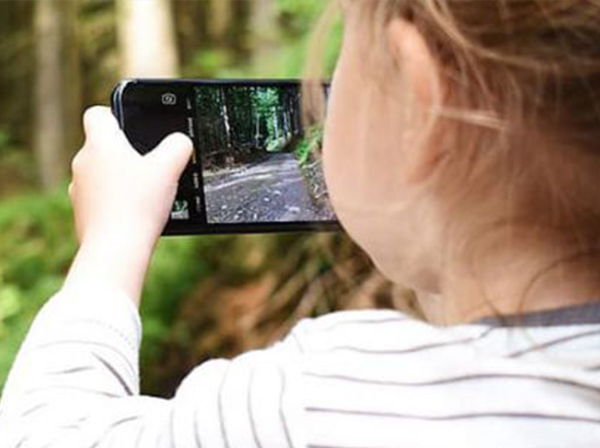 Photography competition - girl with phone taking picture