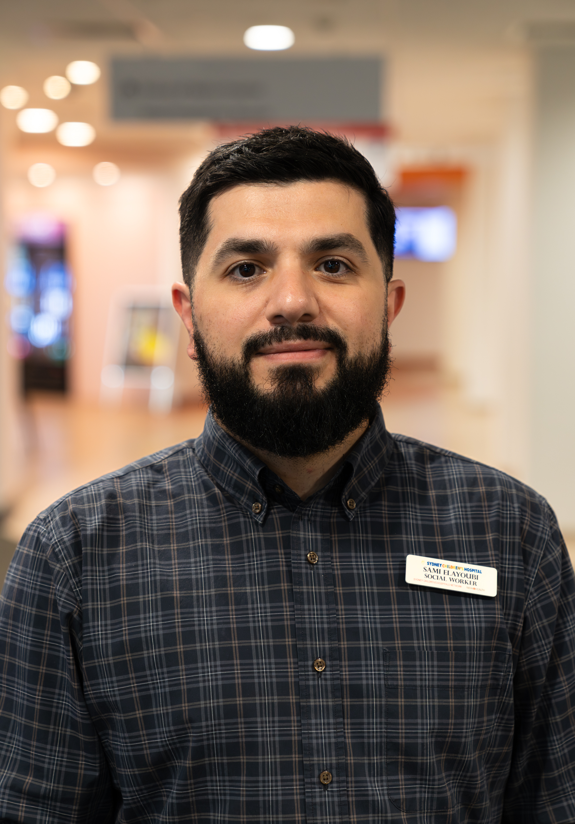 A headshot of Social Worker Sam Elayoubi