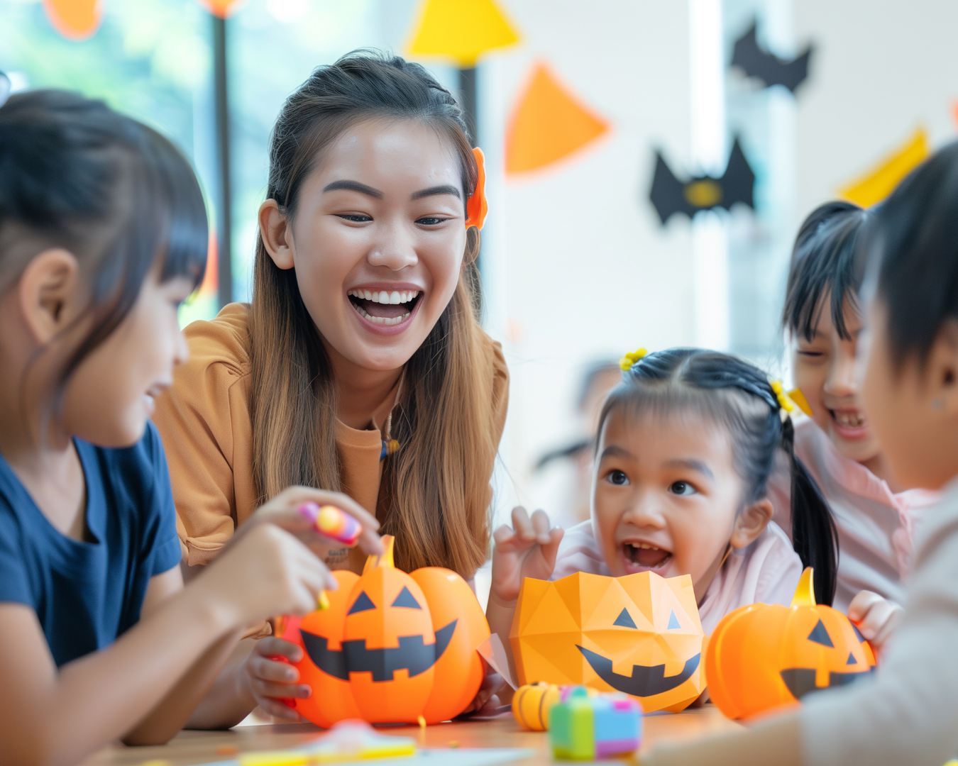 Children and an adult decorating Halloween pumpkins at a craft table with festive decorations. Children and an adult decorating Halloween pumpkins at a craft table with festive decorations.