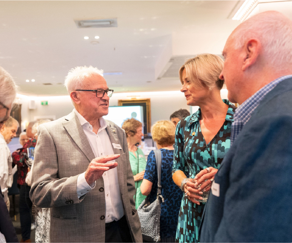 Professor Les White speaking to SCHF CEO Kristina Keneally and guests at an event