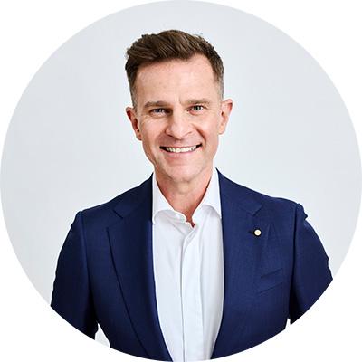 David Campbell wearing a blue suit and white shirt