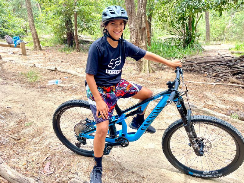 Remy after his hospital journey riding a mountain bike in the bush Remy after his hospital journey riding a mountain bike in the bush