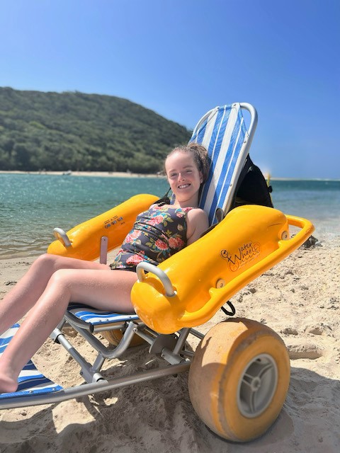 Milla enjoying some sun at the beach