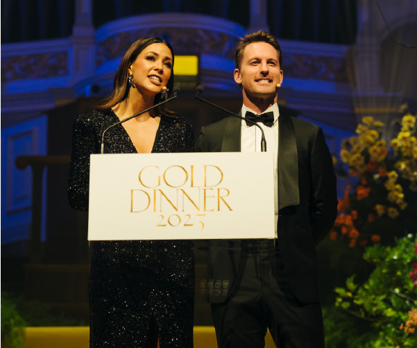 Tara Rushton and Tristan MacManus speaking at Gold Dinner 2023 Tara Rushton and Tristan MacManus speaking at Gold Dinner 2023