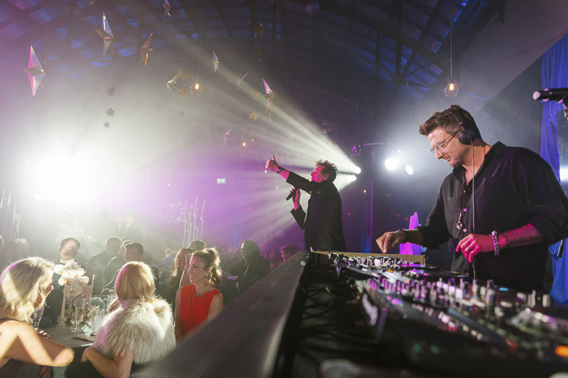 A singer and the DJ on stage at Gold Series - Perth 2025 A singer and the DJ on stage at Gold Series - Perth 2025