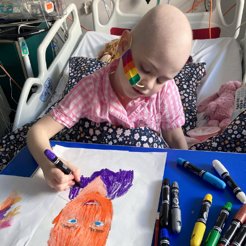 A patient taking part in an art experience in hospital