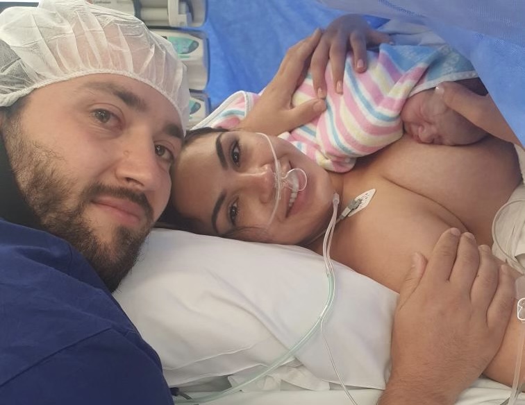 Valentine and his parents right after he was born